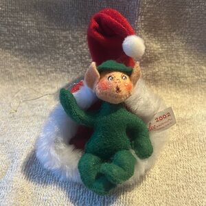 Annalee vintage 2002 elf in a Santa hat ornament.